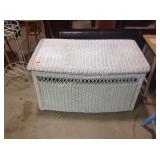 Wicker trunk. Some paint wear. 20"h x 37"w x 21"d