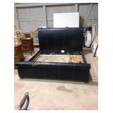 Black leather king size bed frame. Height: 49"