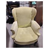 Upholstered wingback chair, some wear, stains