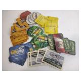 Drink coasters including Heineken, Miller Genuine