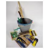 Miscellaneous tools and hardware in bucket