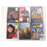 DVDs including Spiral, Swat, Jumanji, Rogue, The