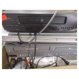 Magnivacs DVD player and four head high-five