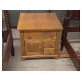 Oak end table. 23"h x 24"sq