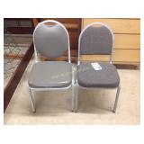 2 stacking chairs.