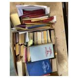 Candles and books including the Readers club,