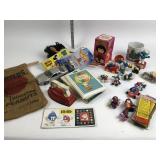Plastic smurf toys, california raisins, barbie,