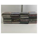 Variety of CDs including music from red shoe