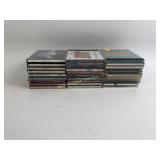 Variety of CDs including sting, xtc, Whitney