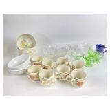 Green glass cups, crystal glassware, flower motif