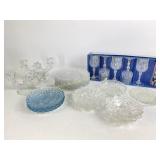 Crystal glass cups and bowls, plates and candle