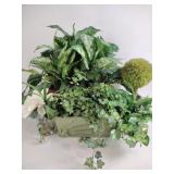 Fake shrubbery, plants, flowers in ceramic vases