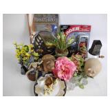 Fake flowers and vases, ceramic pig figurines,