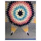 Large hand-stitched starburst hand top stitched