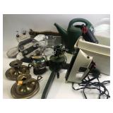 Plastic watering can, brass candle holders, iron,