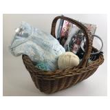 Wicker basket with yarn rolls, women