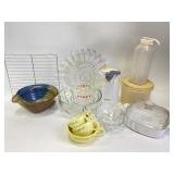 Electric can opener, measuring cups, baking dish,