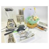 Kitchen supplies including blender, food