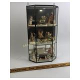 Brass and glass display case with ceramic