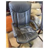 Black leather office chair, slightly worn/dirty
