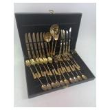 Wm. Rogers gold tone flatware set