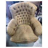 Burnt orange armchair w/ wooden legs, 32in w, 37in