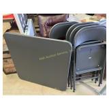 Folding table and four folding chairs