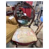Wooden chair with renaissance scene on cushion,