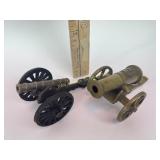Miniature cannons, one brass