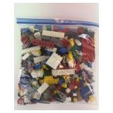 Lego assortment- bricks, people, wheels, etc