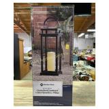 Oversized lantern with flameless pillar candle,