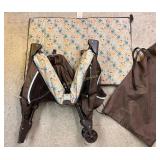 Collapsible Pack and Play with carrying bag.