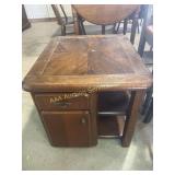 Wooden side table, 24in wide, 21in tall, worn,