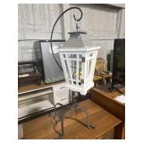 Large lantern on metal stand