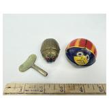 Vintage metal toy rolling bugs, key