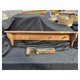 Ball hitch and coat rack shelf