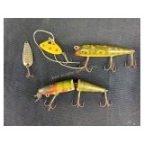 Vintage fishing lures including C. C. B. Co.