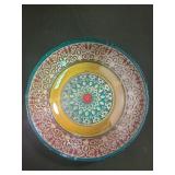 Large decorative  plate, artificial plants, bird