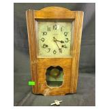 Hope trademark wooden wind up clock, key inside