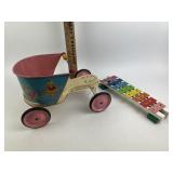 Tin litho doll riding toy, toy xylophone