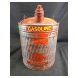 Chippy red galvanized metal gasoline can