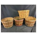 Assortment of sizes of wooden bushel baskets and