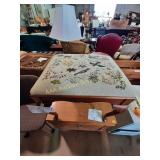 Vintage Ottoman with embroidered cushion.
