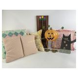 Small decorative pillows, metal pumpkin, wooden