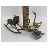 Brass cannon, rocking horse, swans
