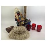 Ruby glasses, petrified wood, wool hat, Apple