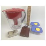 Round mirror, Bosca leather flask, plastic food