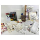 Doilies, embroidered napkins, craft scissors, memo