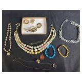 Costume jewelry, necklaces, bracelets, pins