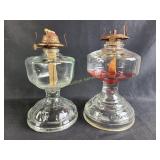 Two oil lamps